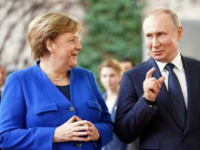 Экс-премьер РФ: Меркель убедила Путина подписать Минские соглашения